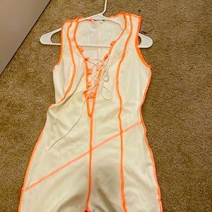 White and orange bodysuit